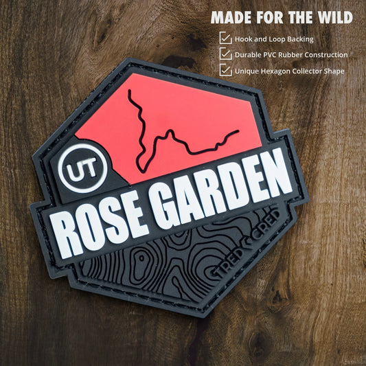 Tred Cred Rose Garden Hill trail patch in red and black PVC rubber with hook and loop backing for off-road gear.