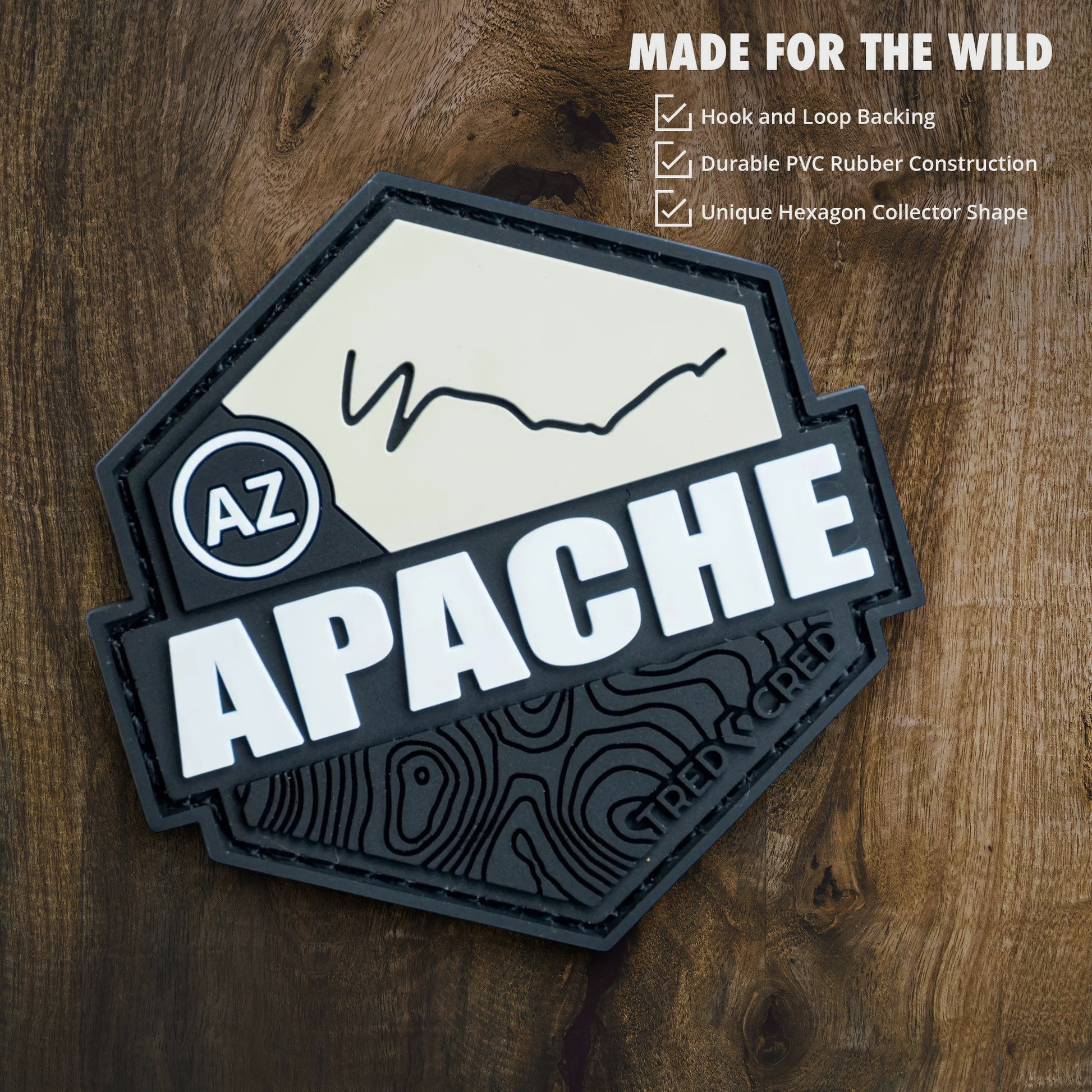 Tred Cred Apache trail patch in a black and cream hexagon shape made of durable PVC rubber with hook and loop backing.