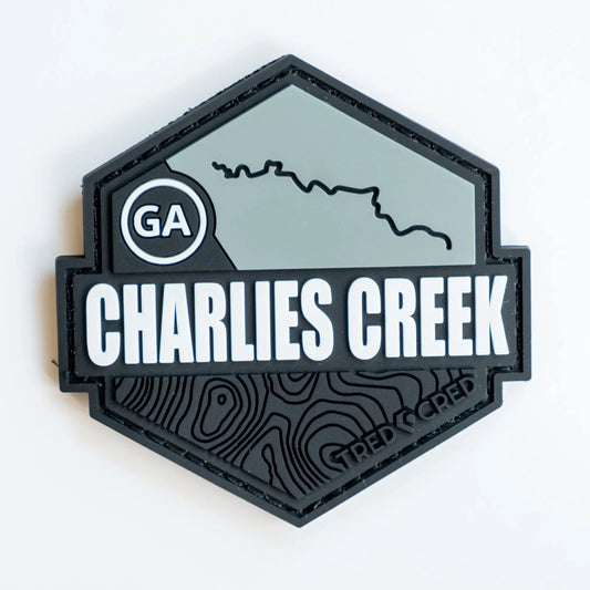 Tred Cred Charlies Creek hexagonal PVC trail patch in grey and black with topographical map and GA state icon