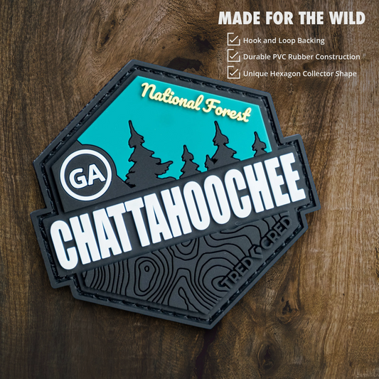 Tred Cred Chattahoochee National Forest hexagon PVC patch with teal, black, and white topographic design.