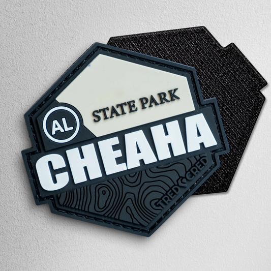 Tred Cred Cheaha State Park PVC patch with black and cream topographic design and Alabama state abbreviation