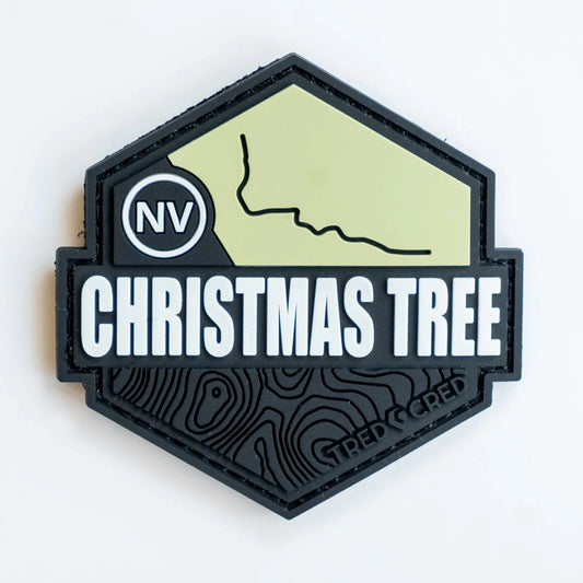 Tred Cred Christmas Tree Pass PVC trail patch with Nevada map, black and light green design, 3x3 inch hook backing.