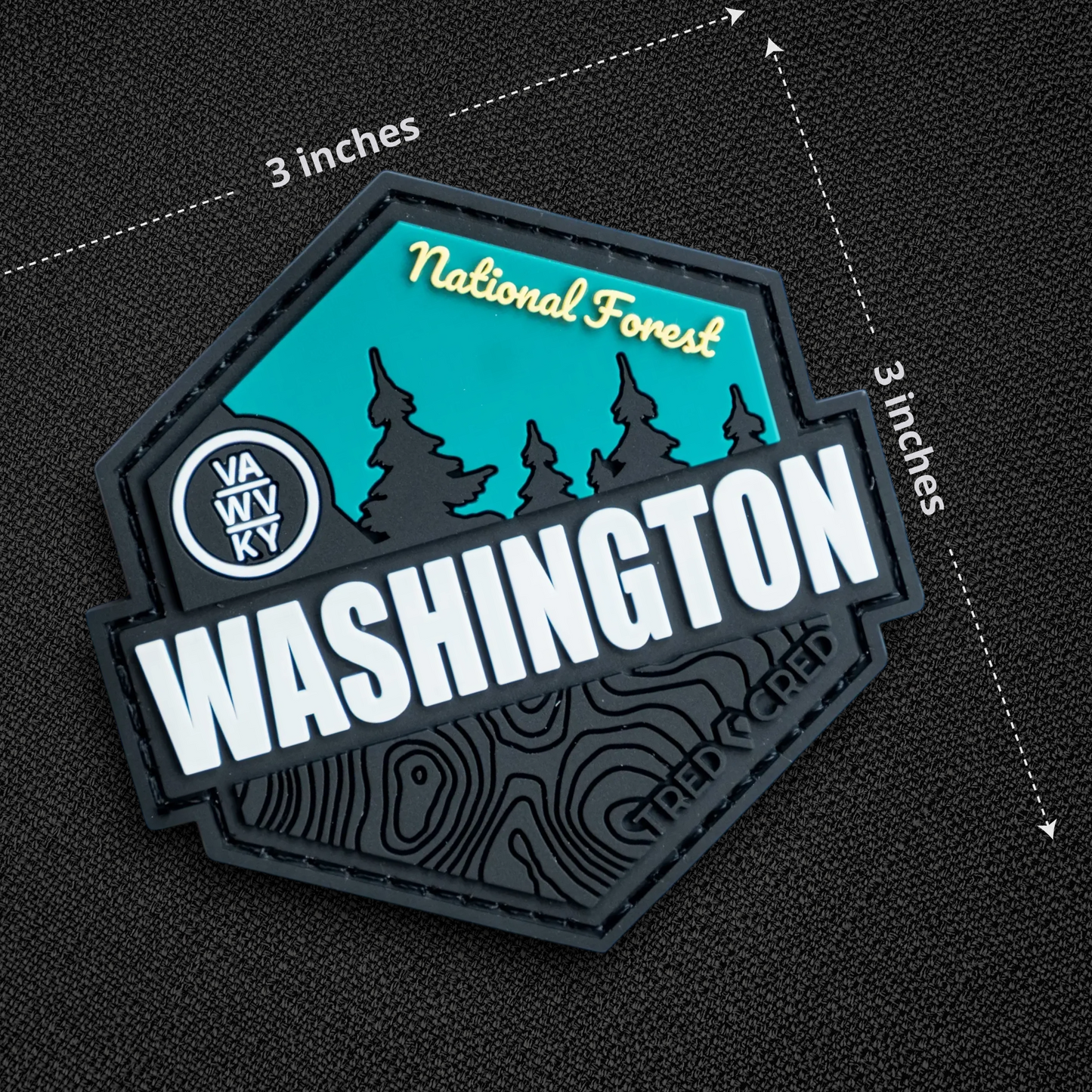 Tred Cred George Washington National Forest PVC patch with teal and black topographic design and hook backing.