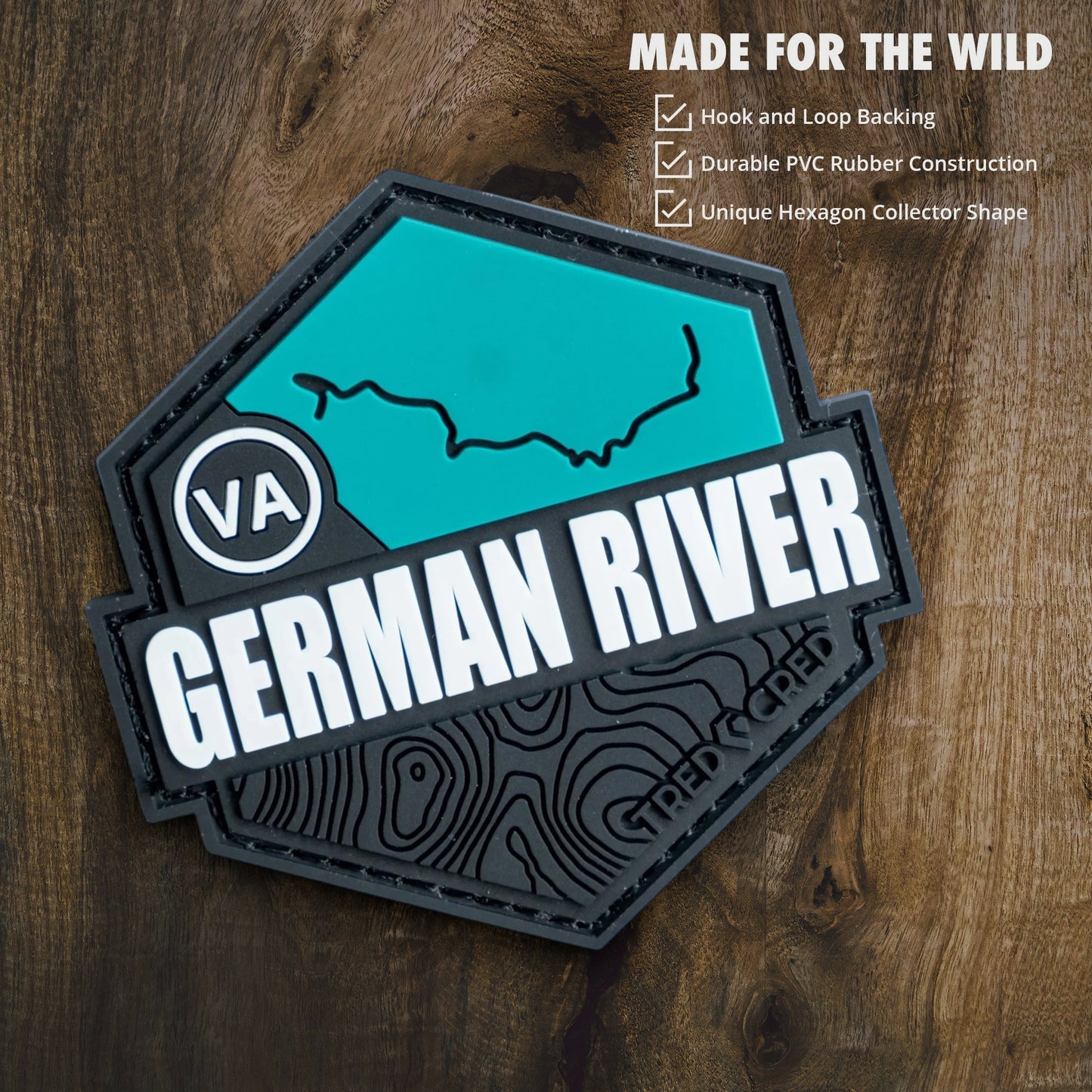 Tred Cred German River trail patch in teal and black PVC rubber with hook and loop backing, 3x3 inch hexagonal badge.