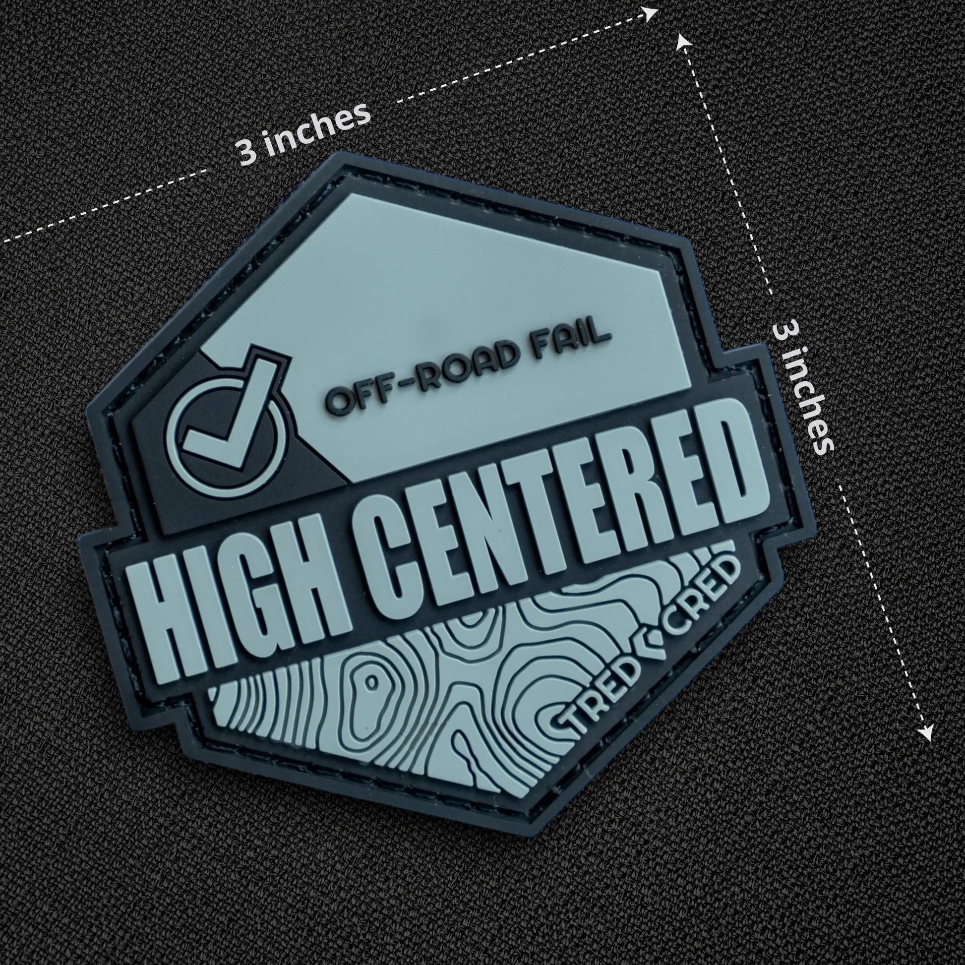 Tred Cred High Centered PVC patch in light blue and black with topographic map design and hook and loop backing.