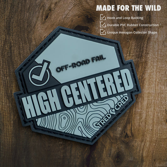 Tred Cred High Centered PVC patch featuring a topographic map design, checkmark, and off-road fail text.