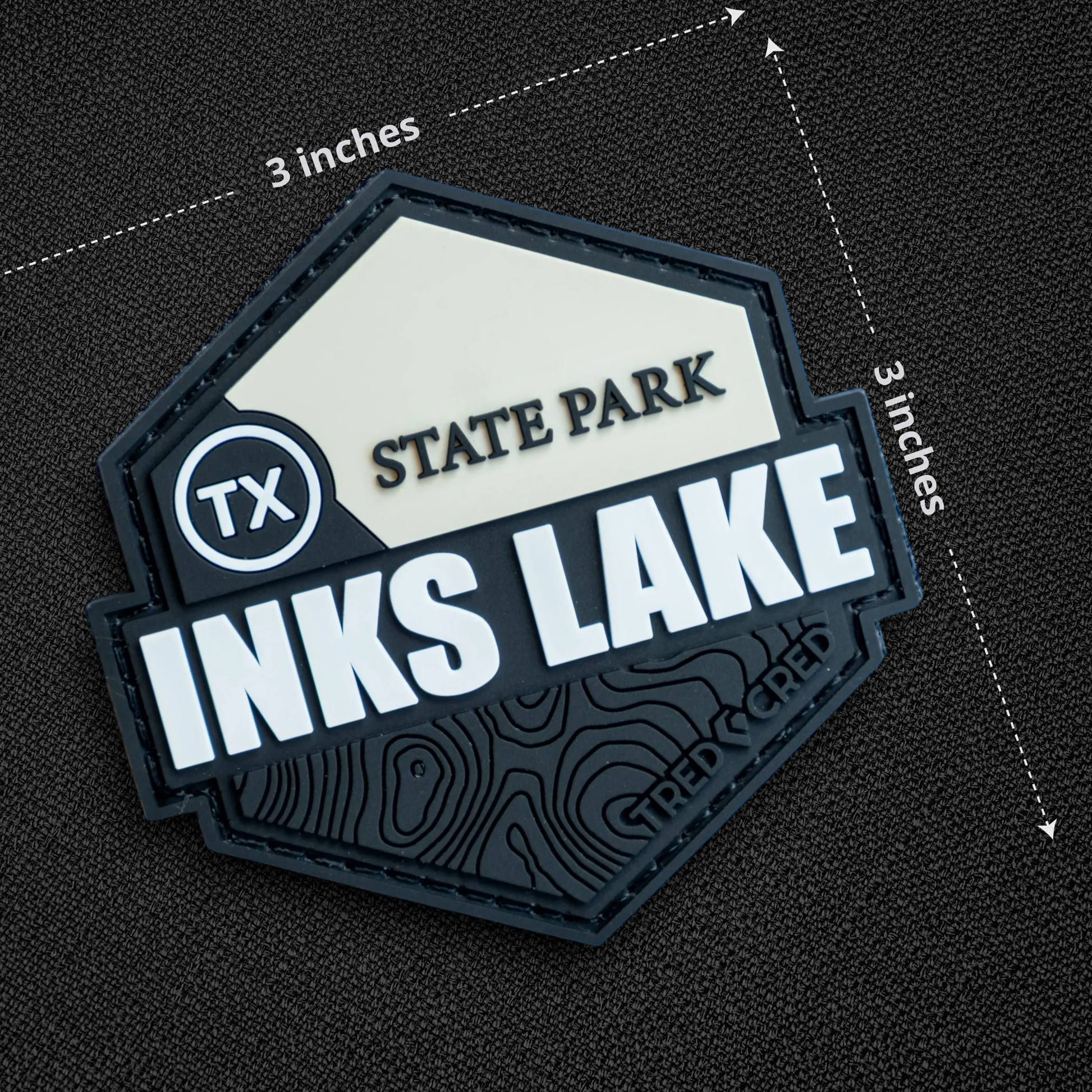 Tred Cred Inks Lake State Park hexagonal PVC patch with topographic map detail and hook and loop backing.