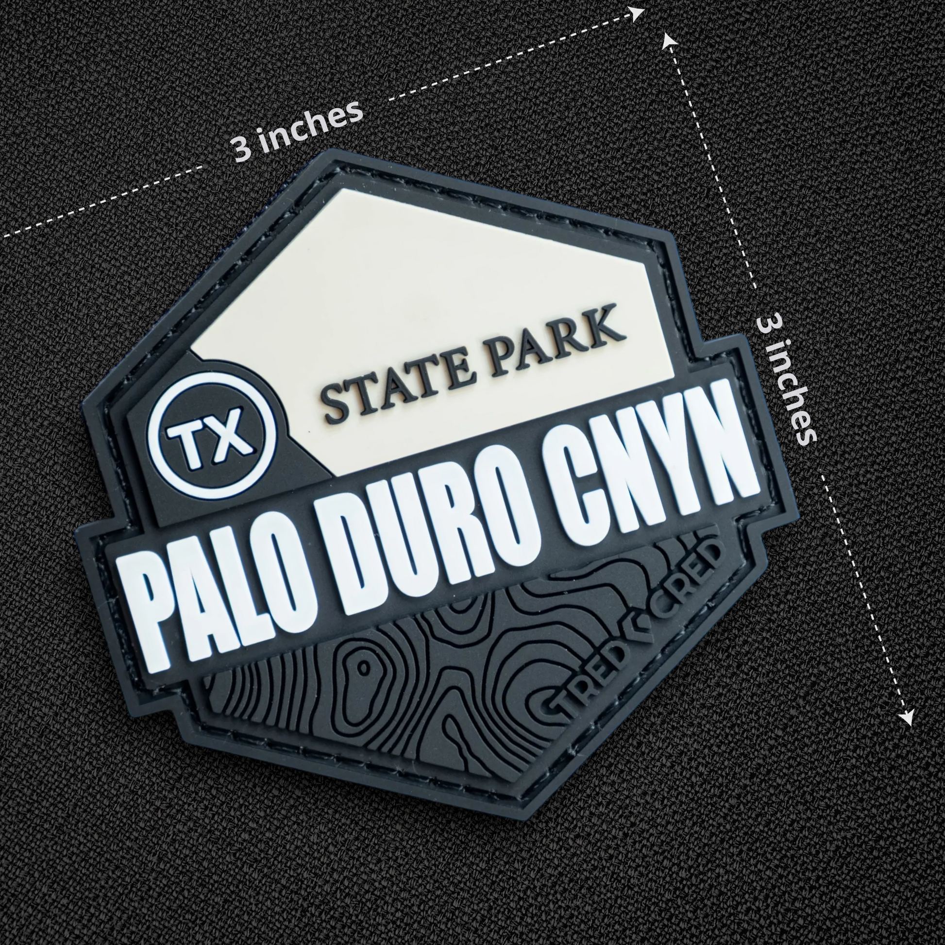 Tred Cred Palo Duro Canyon State Park PVC patch with hook and loop backing, featuring a topographic map design.
