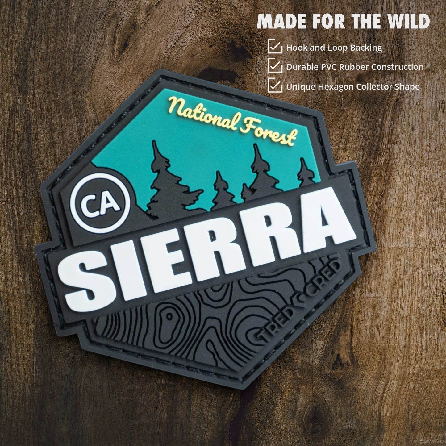 Tred Cred Sierra National Forest PVC patch with teal and black design, hook and loop backing, and topographic detail.