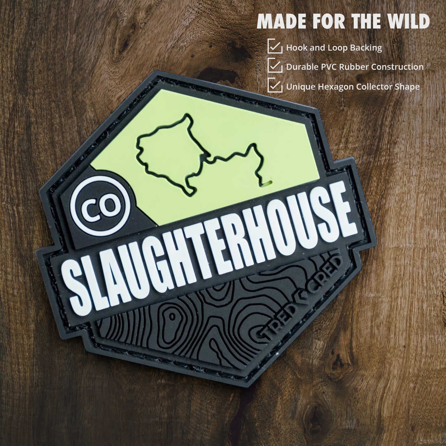Tred Cred Slaughterhouse trail patch in hexagon shape with lime green and black PVC rubber and hook and loop backing.