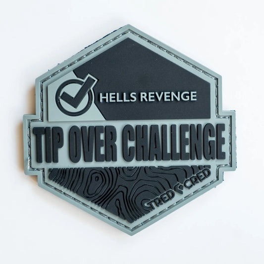 Tred Cred Tip Over Challenge PVC rubber trail patch with Hells Revenge text and topographic map design