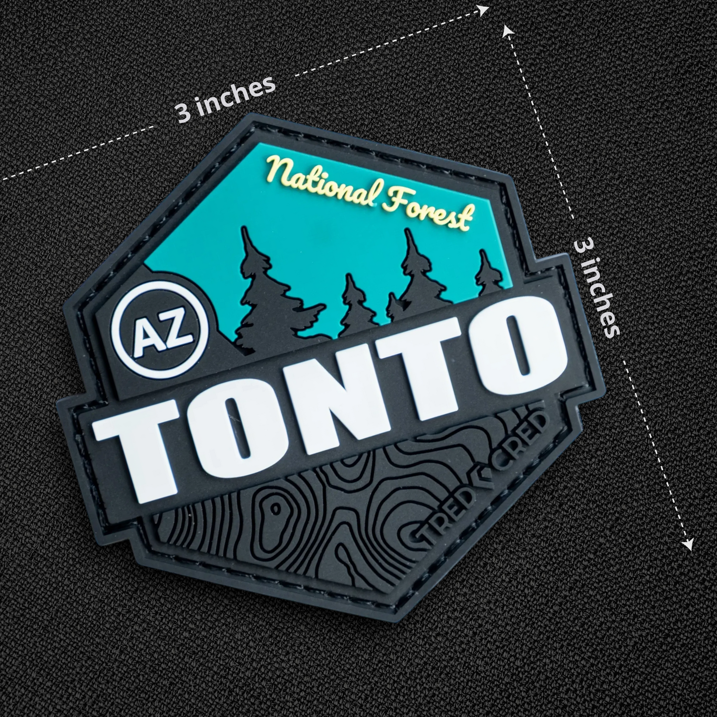 Tred Cred Tonto National Forest PVC patch with teal and black topographic design and hook and loop backing