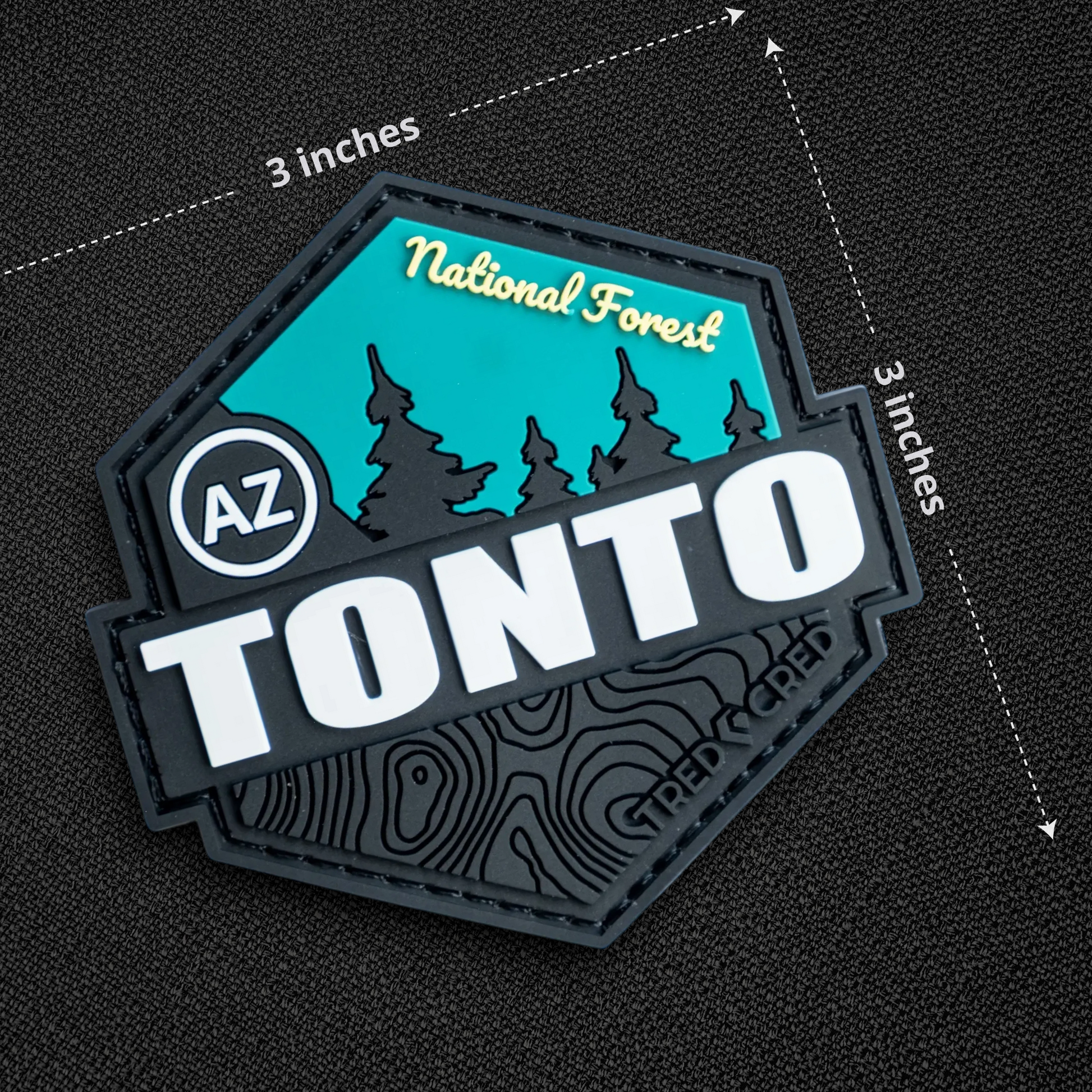 Tred Cred Tonto National Forest PVC patch with teal and black topographic design and hook and loop backing