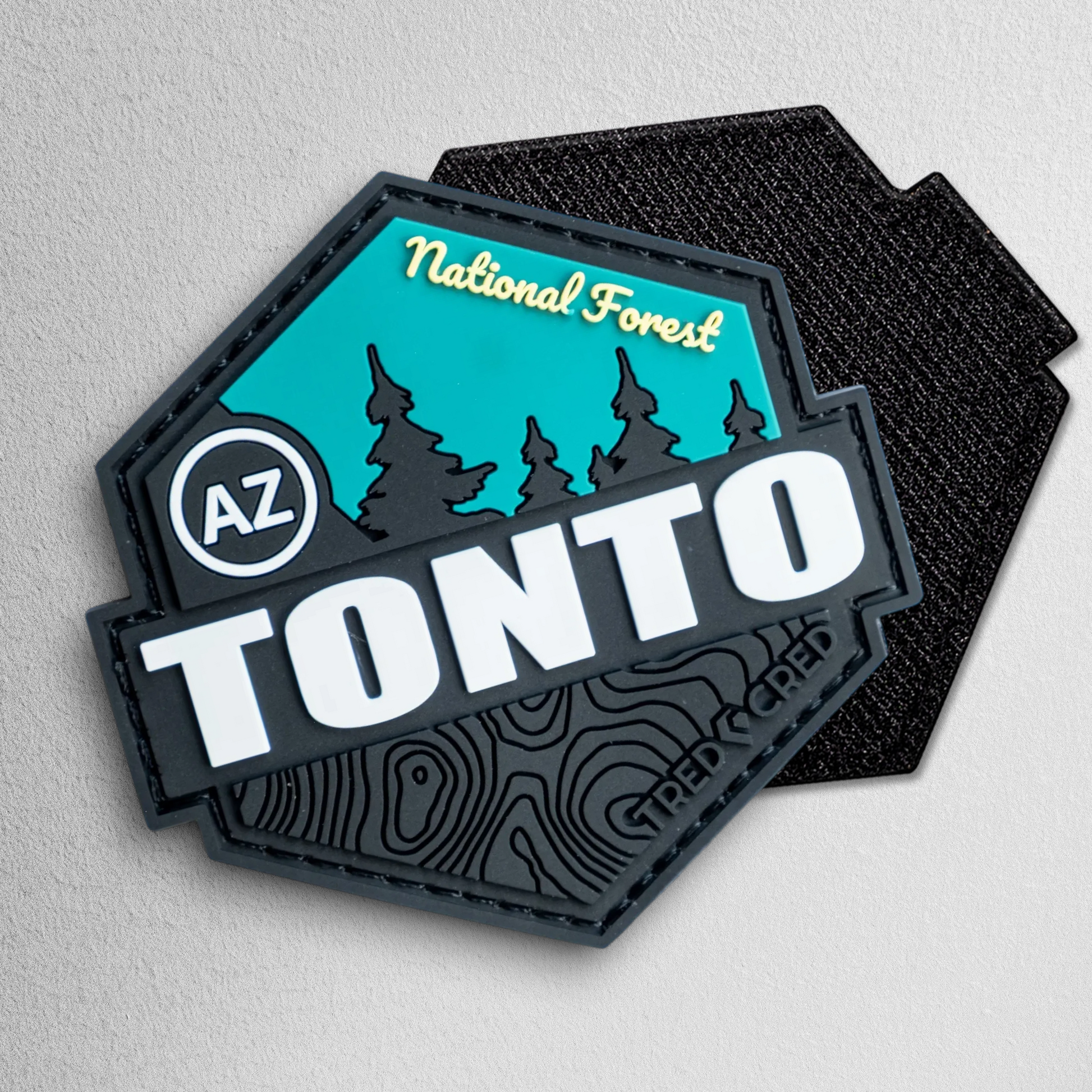 Tred Cred Tonto National Forest PVC patch with teal and black design, AZ badge, and hook and loop backing.